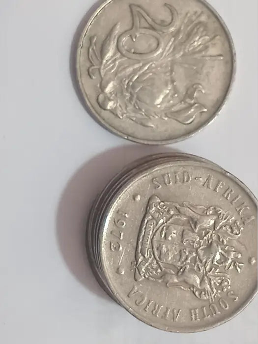 Two 1972 20 cent coins - larger image on grey background