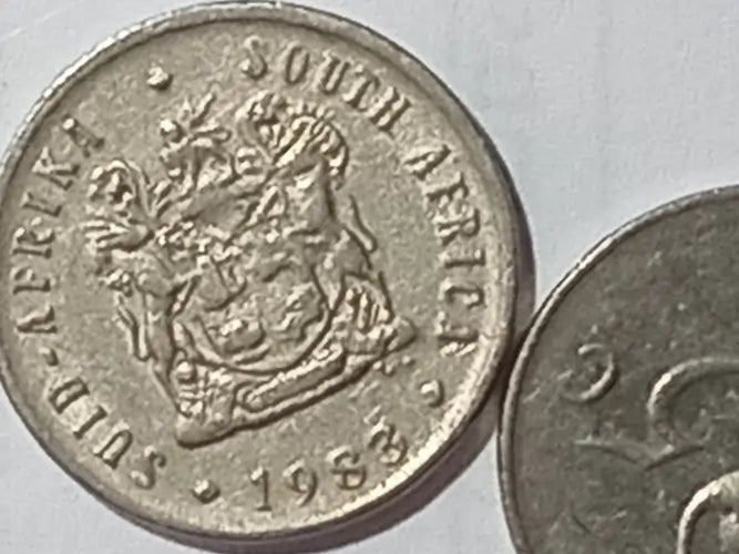 1983 5 cent coin displaying coat of arms