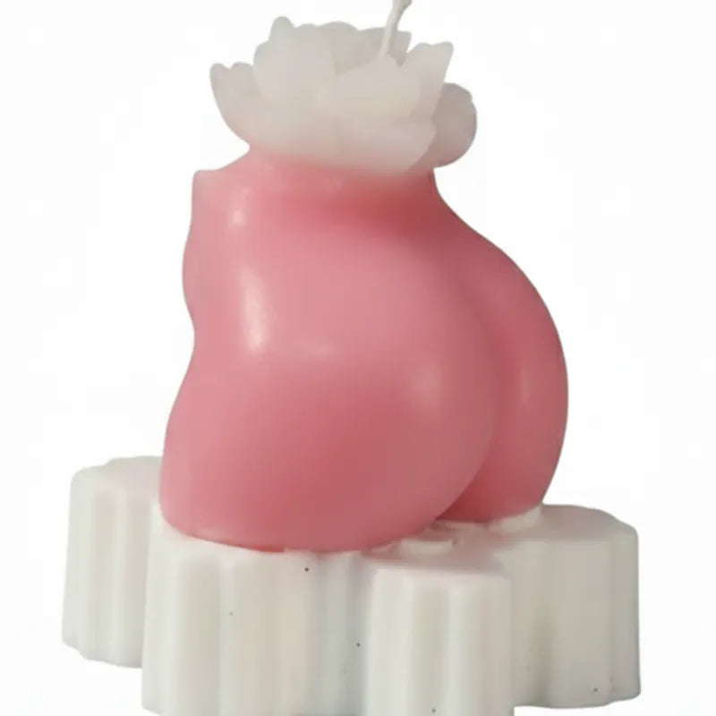 Cheeks the Charm (PINK COLOUR ) ON A SINGLE STAR SHAPE HOLDER AND WHITE ROSE CANDLE POSITIONED ON TOP