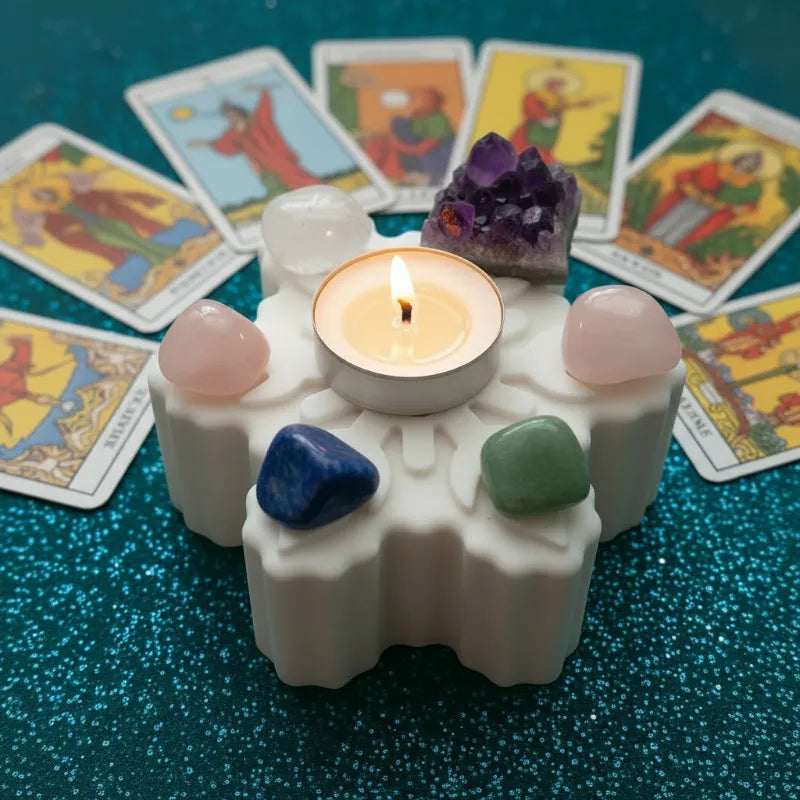 Star holder being used with crystals and tarot cards.
