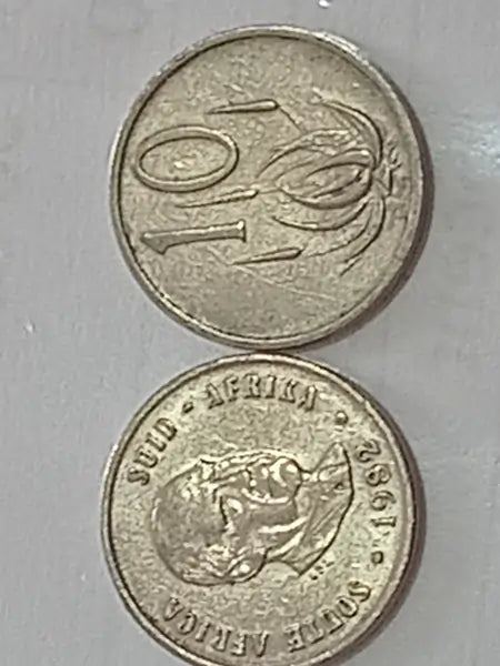 1982 10 Cent coin dual sides shown on grey background