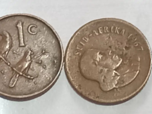 Two 1967 - 1 Cent Presidential coins, on a white background.