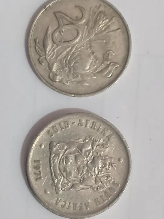 Two 1971 20c cent coins 
on a white background