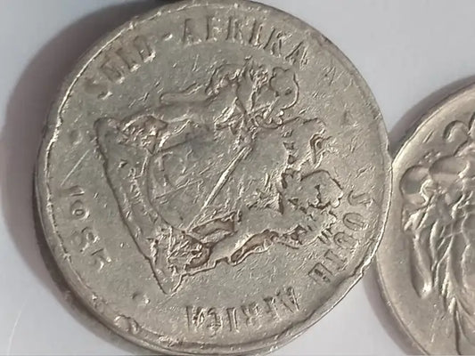 1985 20 cent coin on a white background