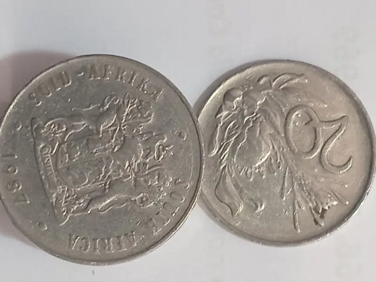 Two 1987 20c coins  on a white background