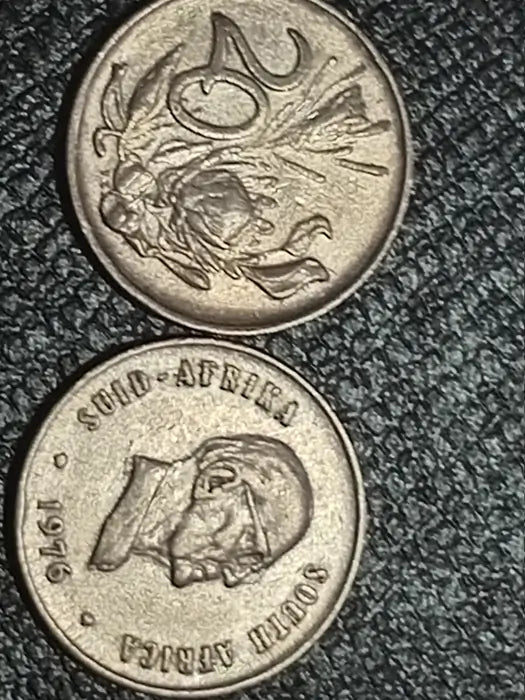 1976 20 cent coins -  dual sides on a tblack extured surface