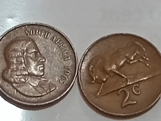Two 1967 2 Cent Presidential series  coins from South Africa on a white background