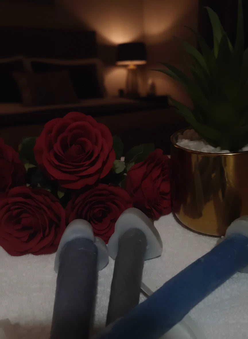 red roses with candle