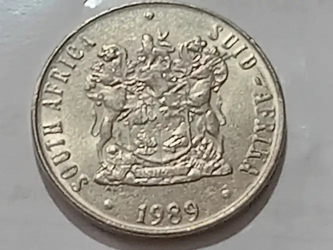 1989 50 cent - coin reverse  with 'South Africa' text and coat of arms design, dated 1989, on a gray background.