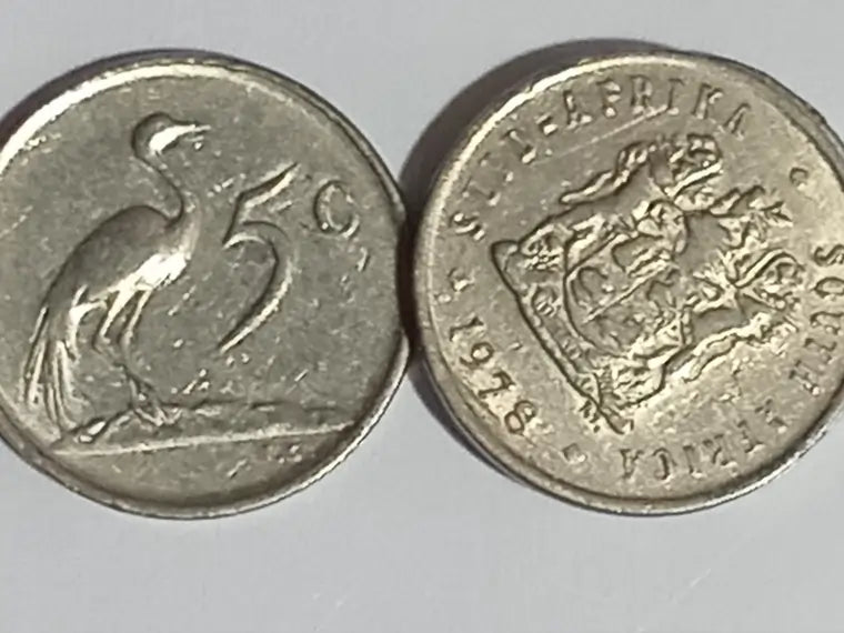 Two 1978 - 5 Cent coins on a gray background