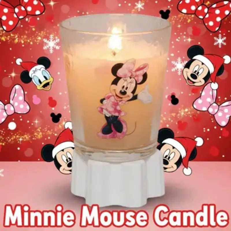 Minnie Mouse candle with a festive background featuring cartoon characters.