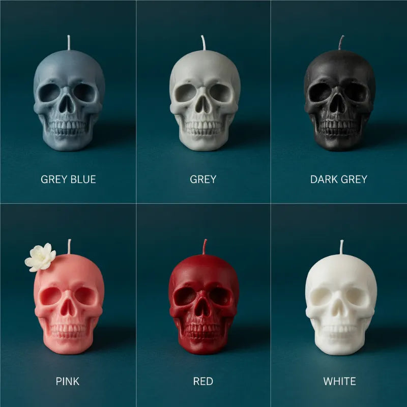 Skull-shaped candles in various colors on a dark blue background