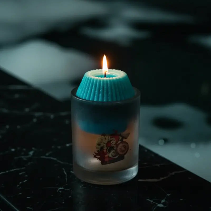 LAVA Avengers-candle with blue wick on bathtub/ dark surface