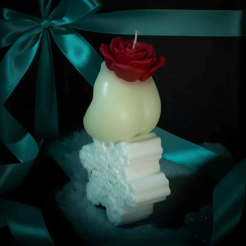 Cheeks the Charm - angled view, ON A SINGLE STAR SHAPE HOLDER WITH a passion-red rose CANDLE POSITIONED ON TOP
