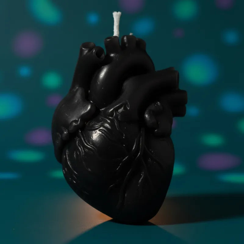 Black color heart candle