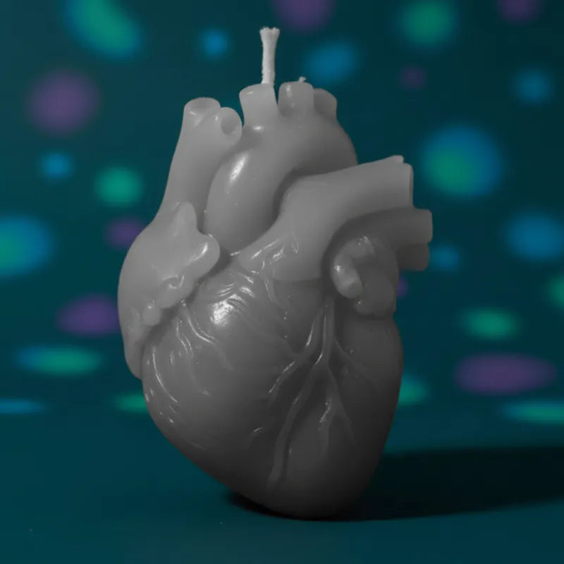 Grey color heart candle