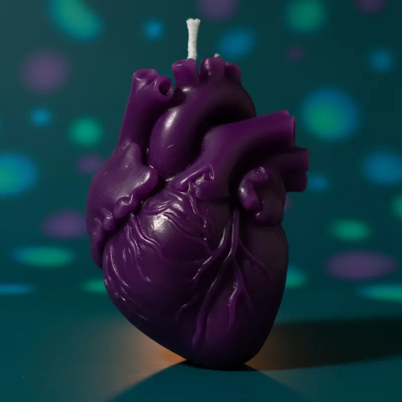 Purple color heart candle