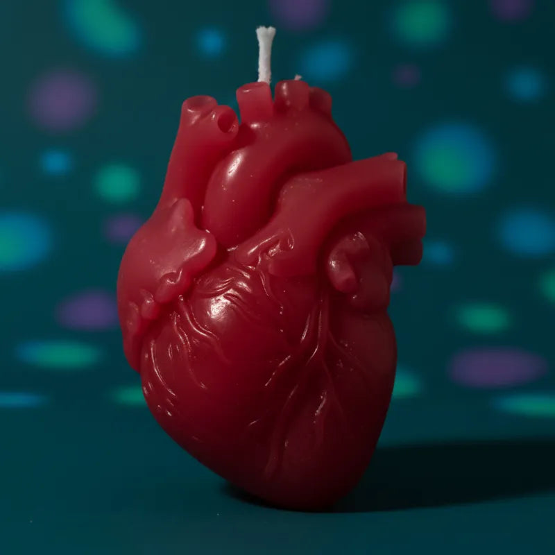 Red color heart candle