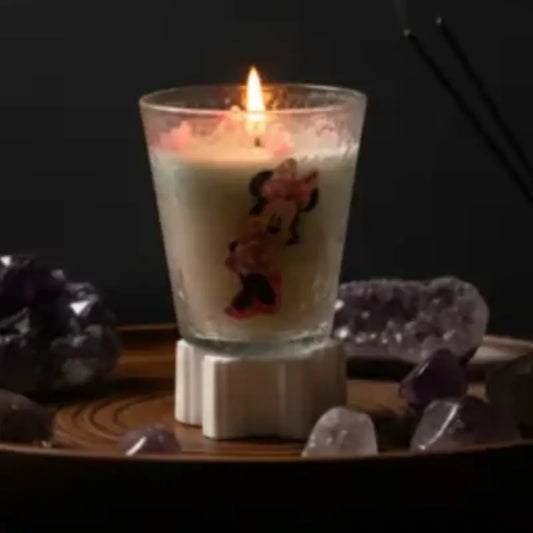 minnie-mouse-candle on a dark background