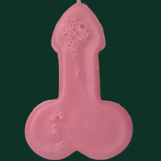 Pink rocket mode candle on a plain background. zoomed in for detail/effects