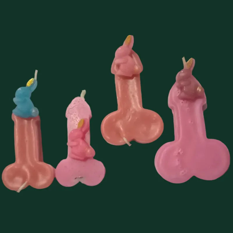 Set of novelty candles with mini bunnies on a dark green background