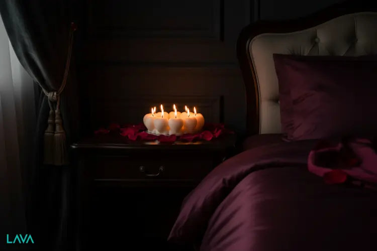 Candle Lit scene with HEART STRUNG candles on a tray 